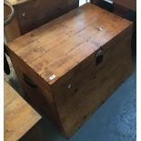 A pine blanket box with leather carry handles, of curved form, said to be a ship's chest, 94cmW