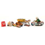 A selection of tin plate toys, to include a man riding a motorcycle, 'Made in England'; A horse