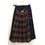 A The Scotch House tartan skirt; together with a Mosbrooke blackwall kilt skirt (2)
