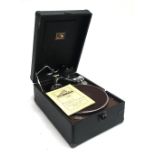 An HMV wind up portable gramophone