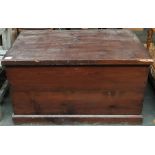 A stained pine blanket box with interior candle box and metal loop carry handles, 95cmW