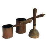 A brass bell with turned wooden handle, together with two copper measure with wooden handles (3)