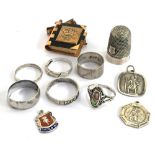 Six silver rings, two silver St Christophers, silver thimble, etc