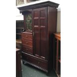 An unusual mahogany wardrobe/chest of drawers with stained glass cupboard door, 120cmW
