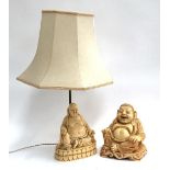 A resin seated buddha, 20cmH; together with a bakelite buddha lamp with shade