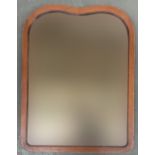 A wall mirror with bevelled glass, 80cmH