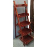 A five shelf folding hardwood stand