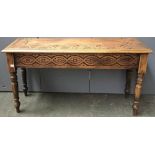 An oak side stool with demilune carved top, 96cmW; together with a very narrow hanging shelf, 188cmL