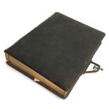 A Victorian photo album, leather bound with gilt page edging, filled with approx. 40 photographs