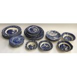 A quantity of blue and white china to include Copeland, Willow pattern, etc