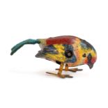 A tin plate clockwork 'Pick-Pick' bird, lithographed tin plate body with felt tail, c.1950,