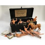 A wooden box filled with a quantity of Action Man figures; together with a small plastic chest