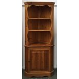 A pine cabinet, shelves above cupboard, 200cmH
