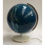 A revolving illuminated star globe, approx. 35cmD