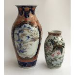 A 20th century Japanese Imari baluster vase (af), heightened in gilt, blue mark to vase, 24.5cmH;