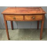 A 19th century light mahogany bow front side table, with light wood and checkered stringing, on