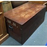 A mahogany travel chest with hinged lid and side handles, marked AWH to side, 84cmW