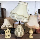 Three table lamps: one in the form of the three graces, one 1970s and the other on turned marble