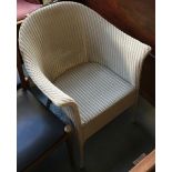 A Lloyd loom style white painted wicker chair