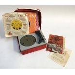 A Playcraft bandbox 745 record player, with instructions; together with three 7" singles, Petula