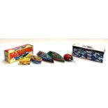 A mixed lot of tin plate clockwork toys, to include a ladybird, boxed blue bird, three boats, a