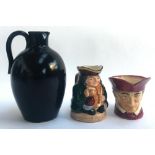 Two Royal Doulton Toby Jugs, 'Honest Measure' and 'Cardinal', together with a Royal Doulton jug (3)