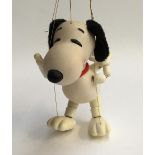 A Pelham Puppet Snoopy, plastic body with felt ears and collar; together with a Pelham Puppet