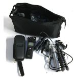 A Zoom H1n Handy Recorder, in hard case, with accessories including hand holder, tripod stand,