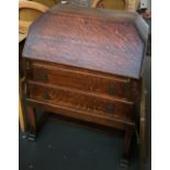 A small oak bureau, fall front over two drawers, on square section legs with H stretcher, 75cmW