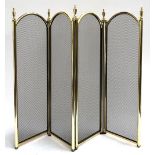 A gilt metal four fold fire screen