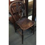 A good quality wheelback kitchen chair on turned legs