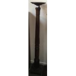 A carved mahogany pot stand on plinth base, 150cmH