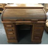 An oak roll top pedestal desk, 'The Lebus Desk', with fitted interior, 102cmW