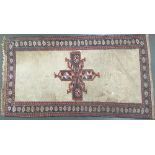 A west Persian rug with cross motif, 200x115cm, together with a further fragment