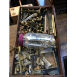 A drawer containing a quantity of brass items, to include door handles, door plates, door knobs,