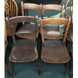 A set of four kitchen chairs, shaped seats on turned legs and H stretchers