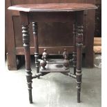 An octagonal occasional table on turned legs, with undershelf, 61cmW