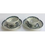 A pair of Worcester tea bowls, 7.5cmD, and saucers 12.5cmD, with blue and white floral pattern (af)