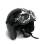 A retro 'BSA' style motorcycle helmet with goggles