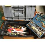 A plastic toolbox, containing a quantity of spanners, socket set etc