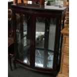 A glazed bowfront display cabinet, 81cmW