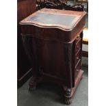 A small Victorian davenport desk, carved gallery, leather skiver to hinged top, the right hand