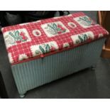 A Lloyd Loom style blanket box with upholstered lid, 75cmW
