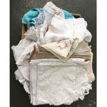 A box of linen napkins and tableware
