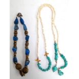 Necklace set with Lapis stones together with a turquoise and seed pearl necklace