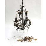 A small 20th century three light chandelier with foliate decoration and cut glass drops, together