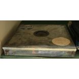 A tin box containing 20 uncut records, bears label 'Pyral 20" mastereos, 355mm, 14"'