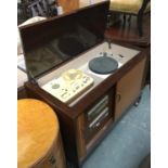 A mid-century radiogram, double lids lifting to reveal a Garrard Model 301 turntable; Telefunken