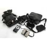 A Panasonic Lumix 12MP camera, with charger; a pair of Minolta UC 6x18 9.7 mini binoculars, in case;