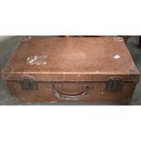 A small leather covered suitcase by Edwin Dawkins & Sons, Axminster, containing a quantity of